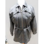 A ladies black leather jacket size 14 with belt, approx measurements; 40" chest, 31" length to back,