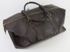 A brown leather weekend bag by Mulberry having canvas shoulder strap,