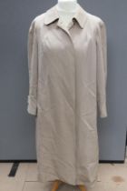 A vintage Burberry trench coat a/f moth holes noted, all wool, approx measurements 40" chest,