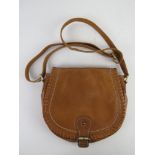 A tan leather cross body handbag by clarks, approx 24cm wide.
