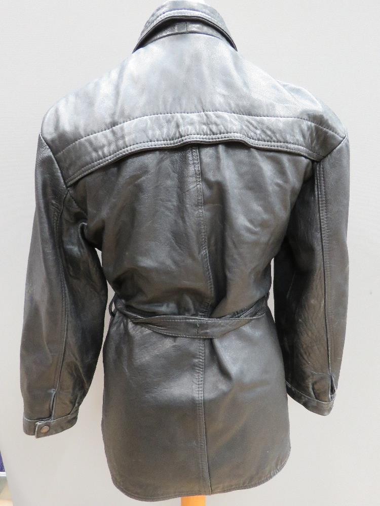 A ladies black leather jacket size 14 with belt, approx measurements; 40" chest, 31" length to back, - Image 2 of 2