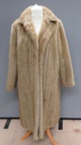 A vintage faux fur coat by Astraka, size 24, measurements approx 40" chest, length to back 45",