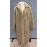 A vintage faux fur coat by Astraka, size 24, measurements approx 40" chest, length to back 45",