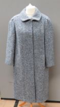 A 75% wool blue ladies coat by Eastex, size 18, approx measurements; 46" chest, 43" length to back,