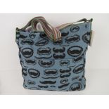 A fabric tote bag having mustache pattern in blue 'as new', approx 38 x 34cm.