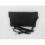 A black clutch purse 'as new', approx 31 x 17cm.