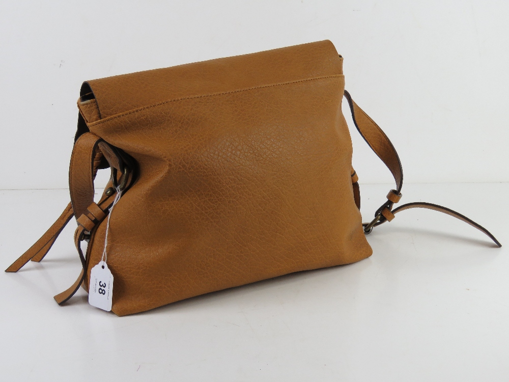 A mustard coloured cross body bag by M&S, slight wear noted to corners, approx 33cm wide. - Image 2 of 5