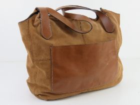 A leather and suede tote bag by Clarks, some marks noted to lining, approx 38cm wide.