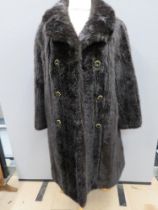 A vintage faux fur coat, approx measurements; 42" chest, 42.5" length to back, 16" underarm sleeve.