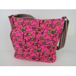 A fabric tote bag having owl pattern in neon pink 'as new', approx 38 x 34cm.
