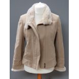 An 80% wool, 5% cashmere jacket having faux fur collar and cuff, approx measurements; 36" chest,