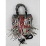 A fringed tote bag 'as new' approx 32 x 35cm.