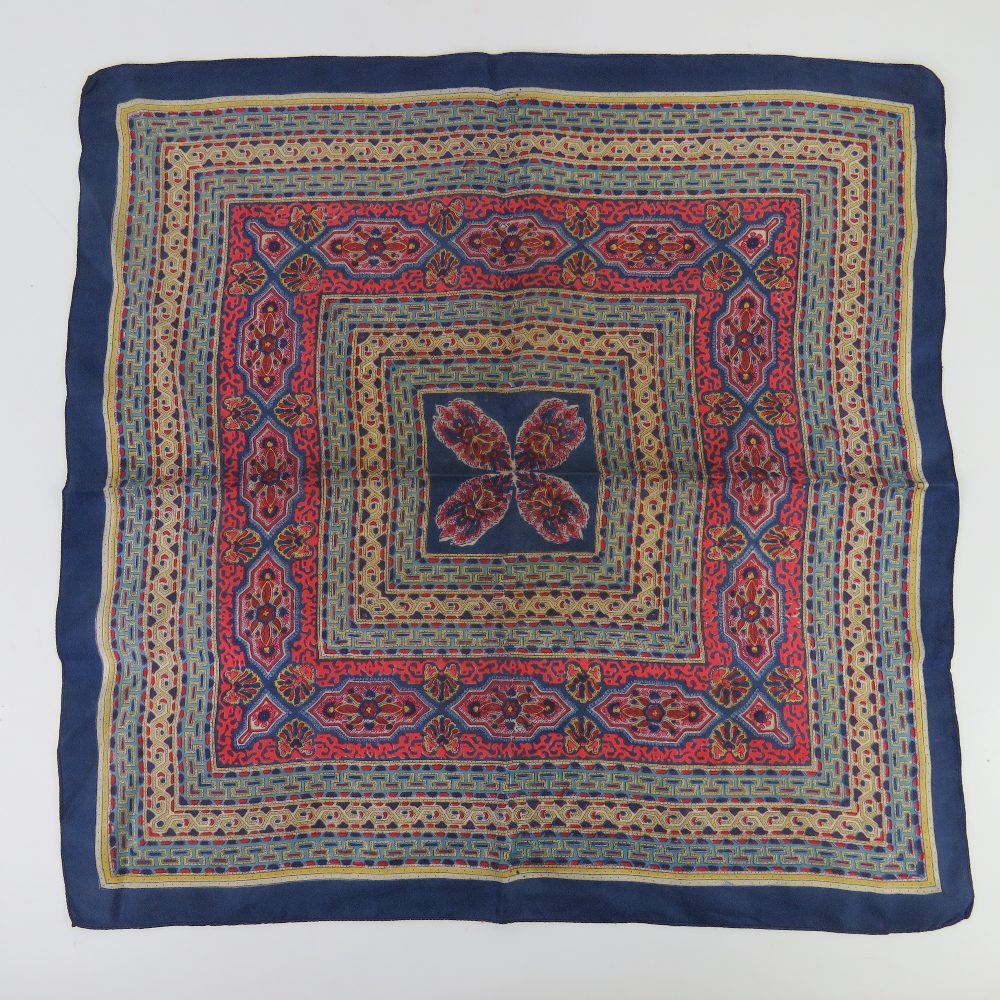 A silk scarf bearing label of Liberty of London.