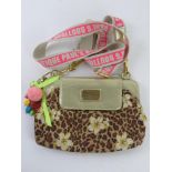 A Paul's Boutique leopard print and floral pattern handbag approx 24cm wide.