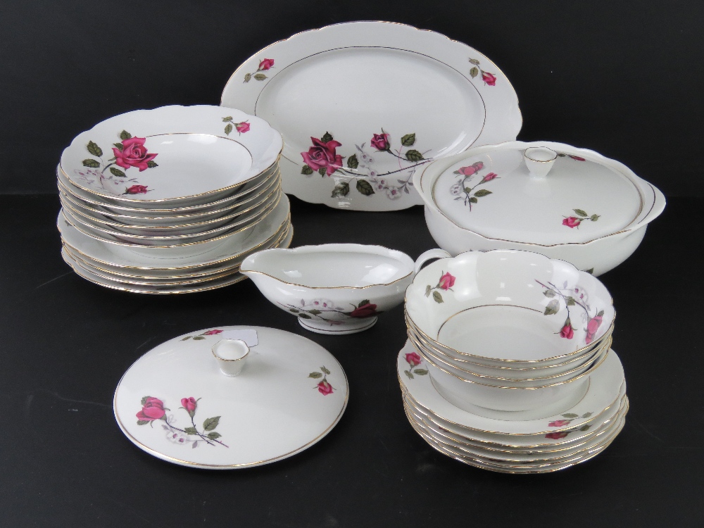 A white ground dinner service decorated with purple roses inc lidded tureen, serving plate,