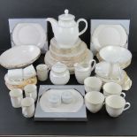 A contemporary white ground tea, coffee and dinner service for six, oven and dishwasher safe.