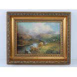 A lacquered print of Highland cattle by river 19 x 14cm in gold painted frame 28.5 x 23cm.