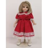 A handmade 20th century bisque headed doll made using an antique doll mould,