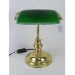 A 'banker's' brass table lamp with green glass shade, untested, for re-wiring.