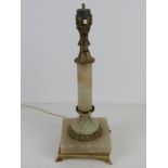 A white onyx and brass table lamp, for rewiring.