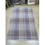 A 'Highland' pattern rug from Dunelm, 120 x 170cm.
