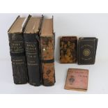 A quantity of vintage books inc three part leather bound vintage bibles,