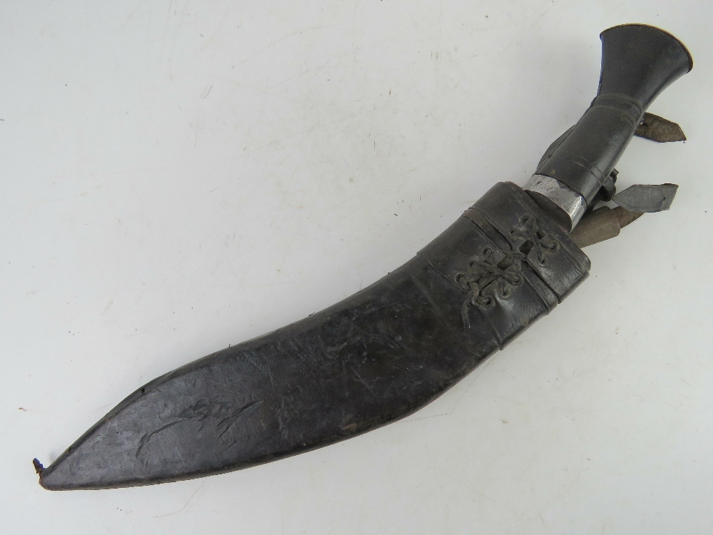 A Gurkha Kukri knife with scabbard and K