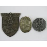 A WWII German Krim shield and two day ba