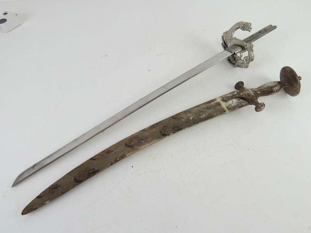 An Antique Indian sword with scabbard to