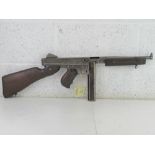 A deactivated Thompson M1A1 SMG, latest
