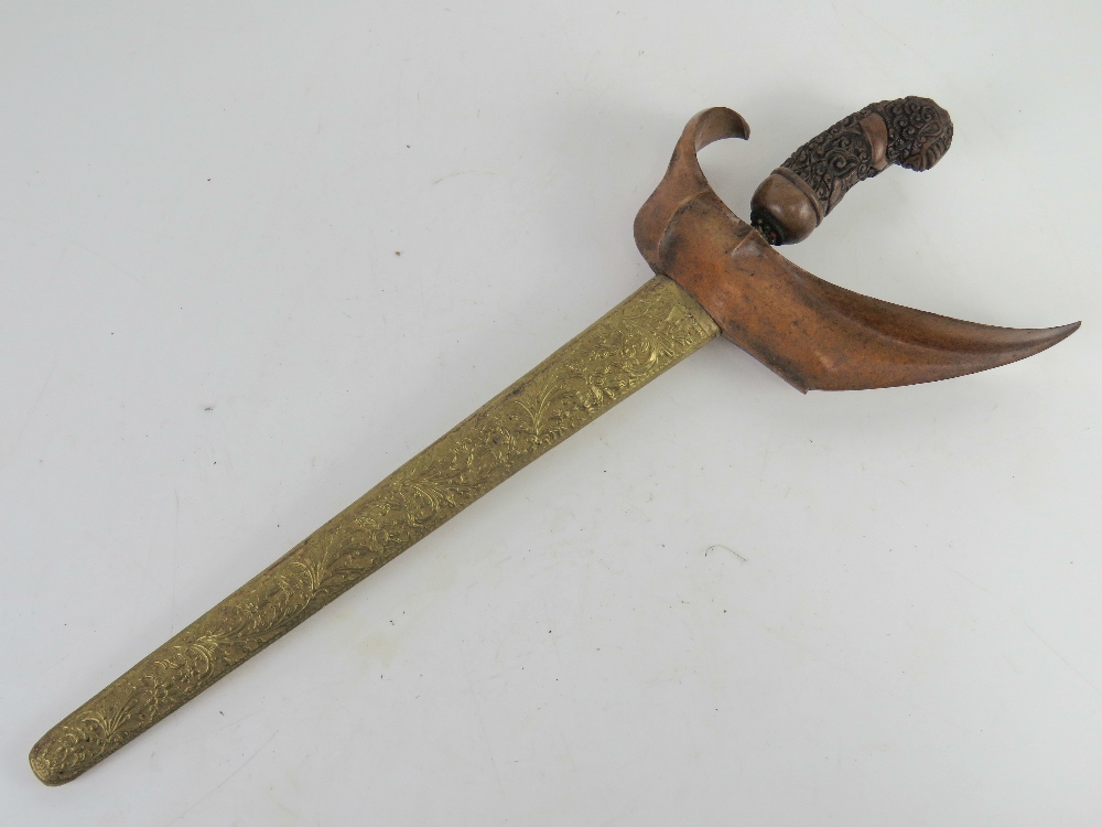 A Kris knife with scabbard having hand c