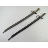 Two French Chassepot sword bayonets with
