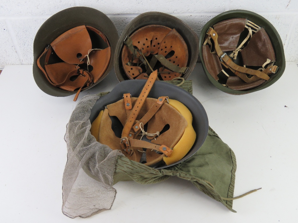 Four assorted military helmets each with - Image 2 of 5