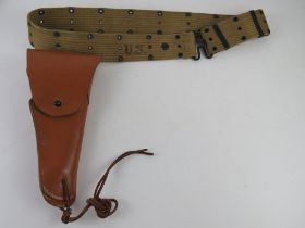 A Colt 1911 leather holster and belt.