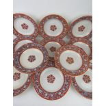 A set of c1850 Victorian dished by Davenport, having orange ground floral patterned border, each 17.