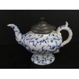 A blue and white mottled ceramic teapot having pewter lid marked 'Marble W' to base,