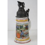 A military themed ceramic beer stein having cannon to lid and lion with shield to handle, of