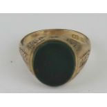 A late Victorian early Edwardian 9ct rose gold signet ring having bloodstone uncarved seal,
