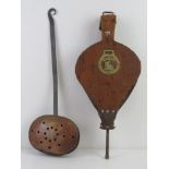 A pair of fireside bellows with applied horse brass, measuring 49cm in length. Together with a