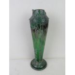 An early 20thC layered glass vase in the style of Gaille, handles deficient, standing 32cm high.