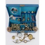 A quantity of assorted costume jewellery within vintage musical box.