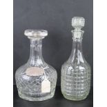 An HM silver Whiskey decanter label together with a Victorian cut glass decanter, associated stopper
