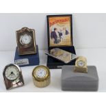 A quantity of assorted contemporary presentation and other Quartz miniature clocks. Together with