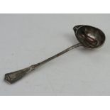A white metal punch ladle having indistinct possibly Continental marks upon, having Art Nouveau