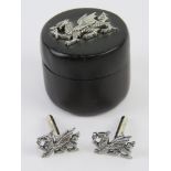 A pair of Welsh dragon cufflinks in presentation trinket pot.