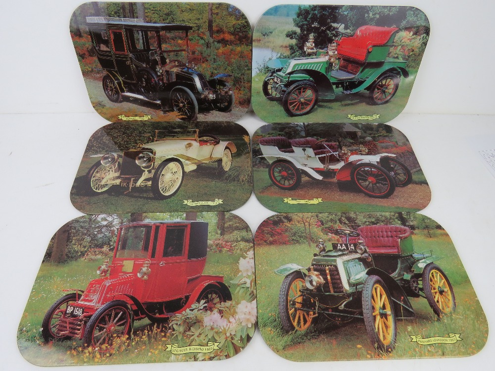 A set of six vintage motor car themed place mats inc Fiat 1903, Renault 1906, Panhard Lavassor 1903,