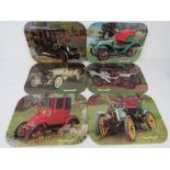 A set of six vintage motor car themed place mats inc Fiat 1903, Renault 1906, Panhard Lavassor 1903,