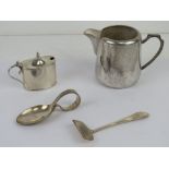 A hallmarked silver mustard pot, liner and spoon deficient,