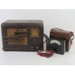 A Bakelite cased radio by Fada together with a vintage Avo Minor volt meter in leather case. Two