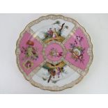 A continental cabinet plate in pink and white ground with floral decoration and figures upon, gilt